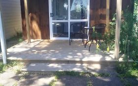 Budget Cabin Accommodation - Bed Shower Toilet